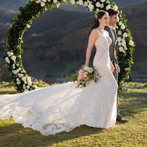 Marina Liana style 1111. Beautiful fit and flare wedding dress.